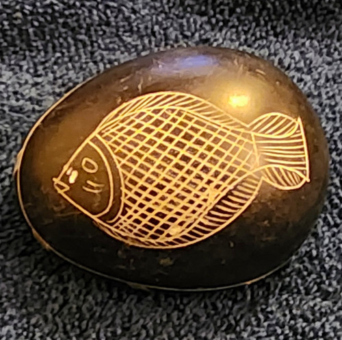 Carved polished black - carved, stone